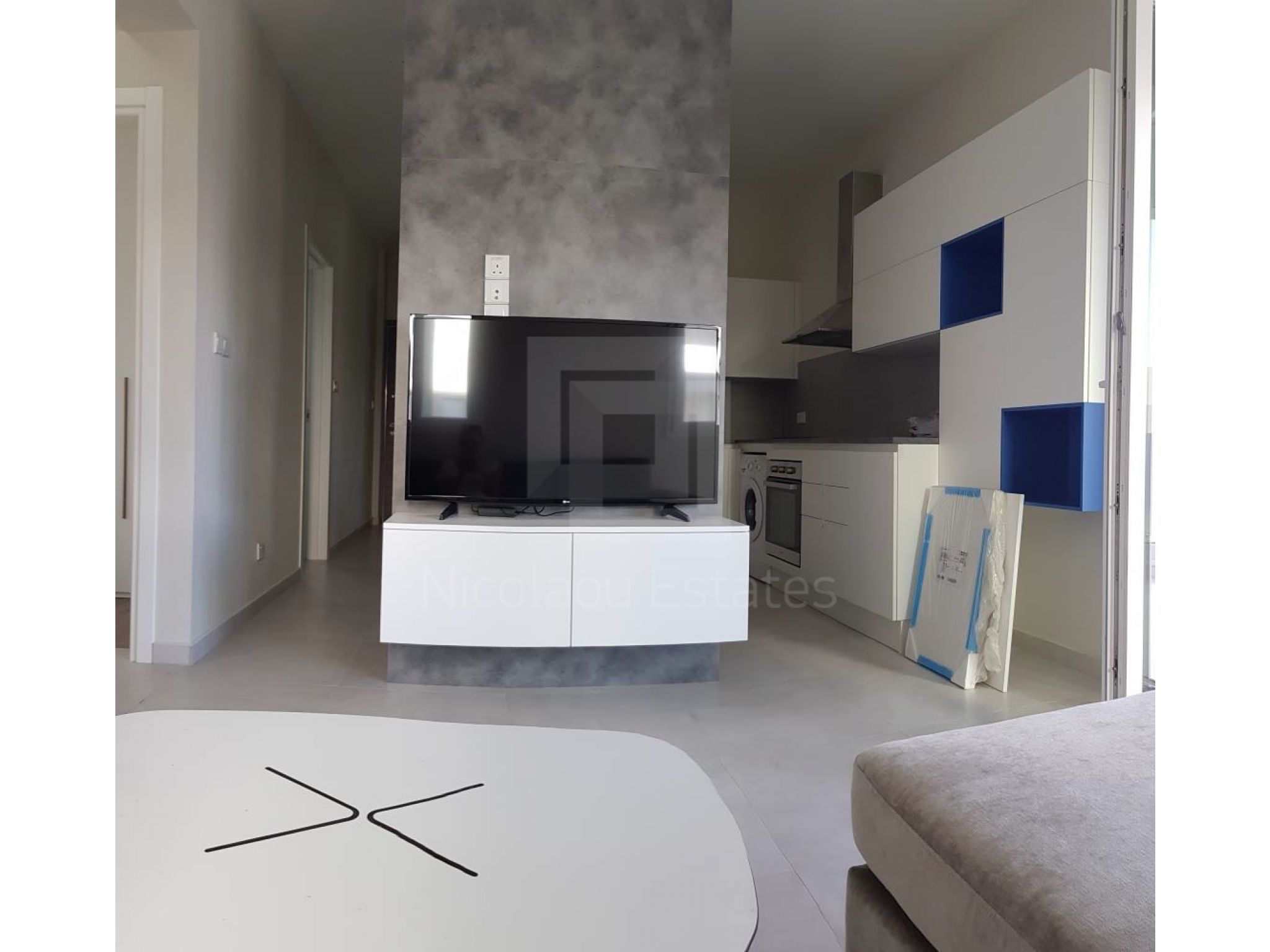 https://www.propertiescy.com/images/uploads/listings/large/14193-1592900596_living-room-open-plan-kitchen.jpg