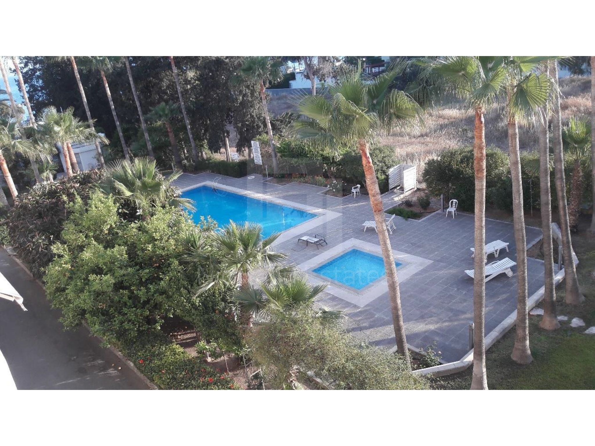 https://www.propertiescy.com/images/uploads/listings/large/14194-1592901219_swimming-pool.jpg